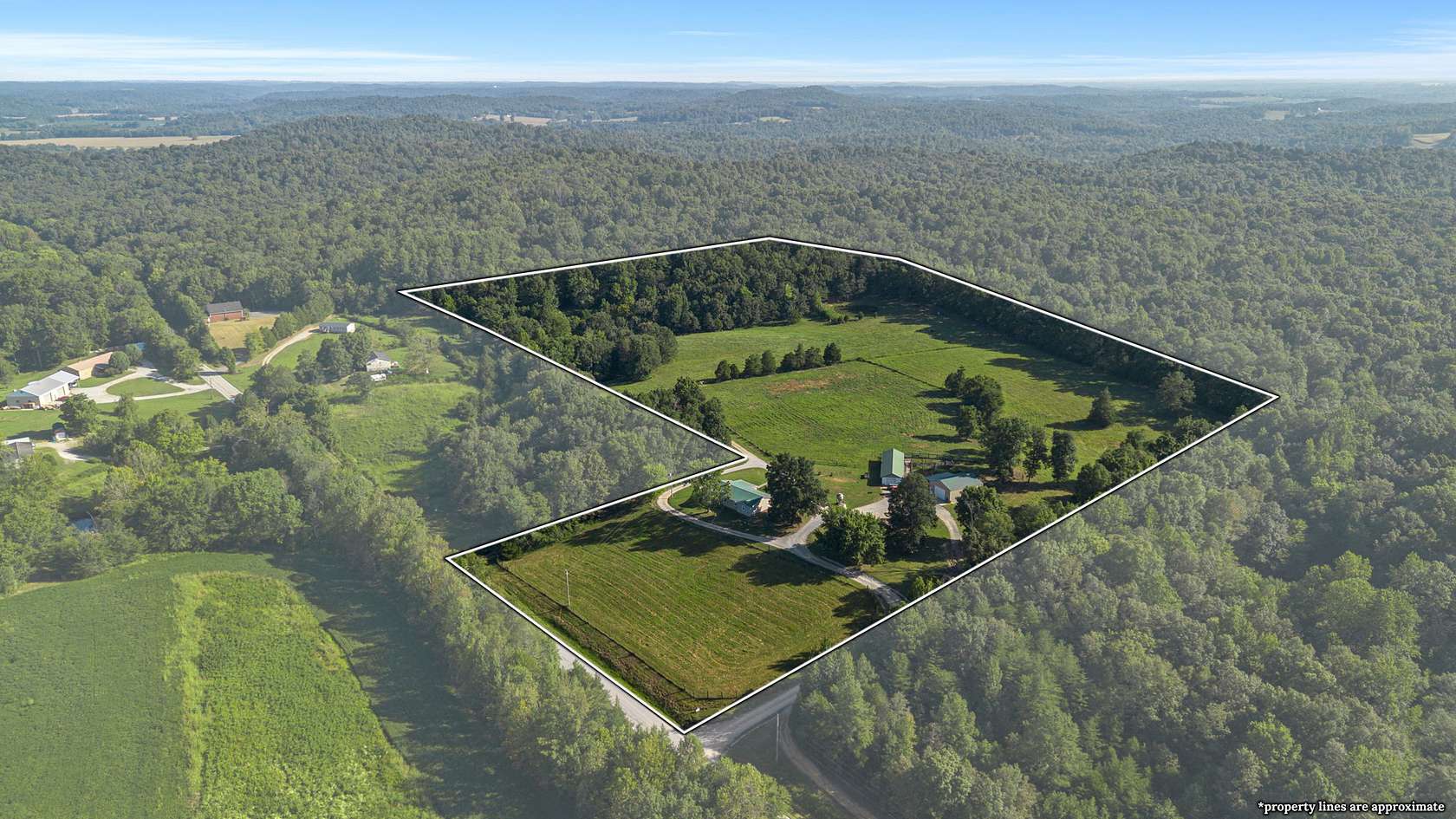19 Acres of Land with Home for Sale in Roundhill, Kentucky