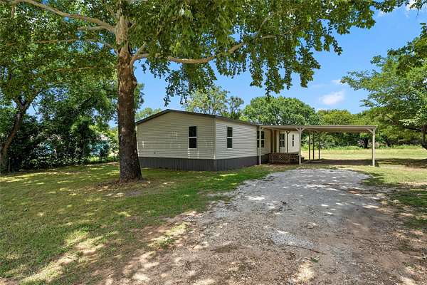 2 Acres of Land with Home for Sale in Aquilla, Texas