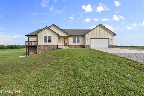 5 Acres of Land with Home for Sale in Friendsville, Tennessee