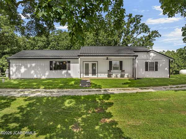 54.5 Acres of Recreational Land with Home for Sale in Holts Summit, Missouri