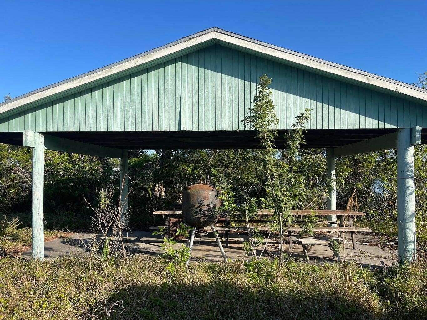 3.66 Acres of Land with Home for Sale in Moore Haven, Florida