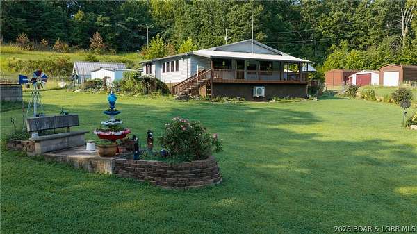 Land with Home for Sale in Stover, Missouri