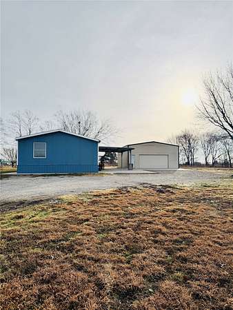 1.84 Acres of Land with Home for Sale in Quinlan, Texas