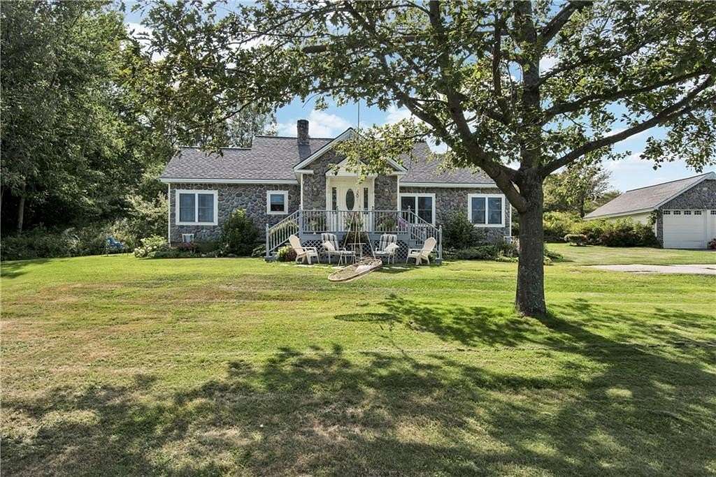 1.69 Acres of Land with Home for Sale in West Paris, Maine
