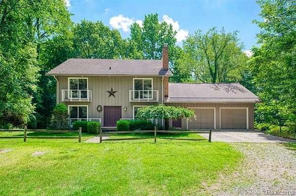 20.5 Acres of Recreational Land with Home for Sale in Brighton Township, Michigan