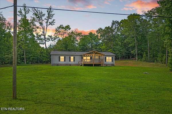 1.66 Acres of Land with Home for Sale in Ten Mile, Tennessee