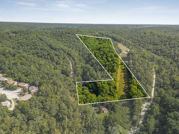 8.16 Acres of Land with Home for Auction in Ashland City, Tennessee