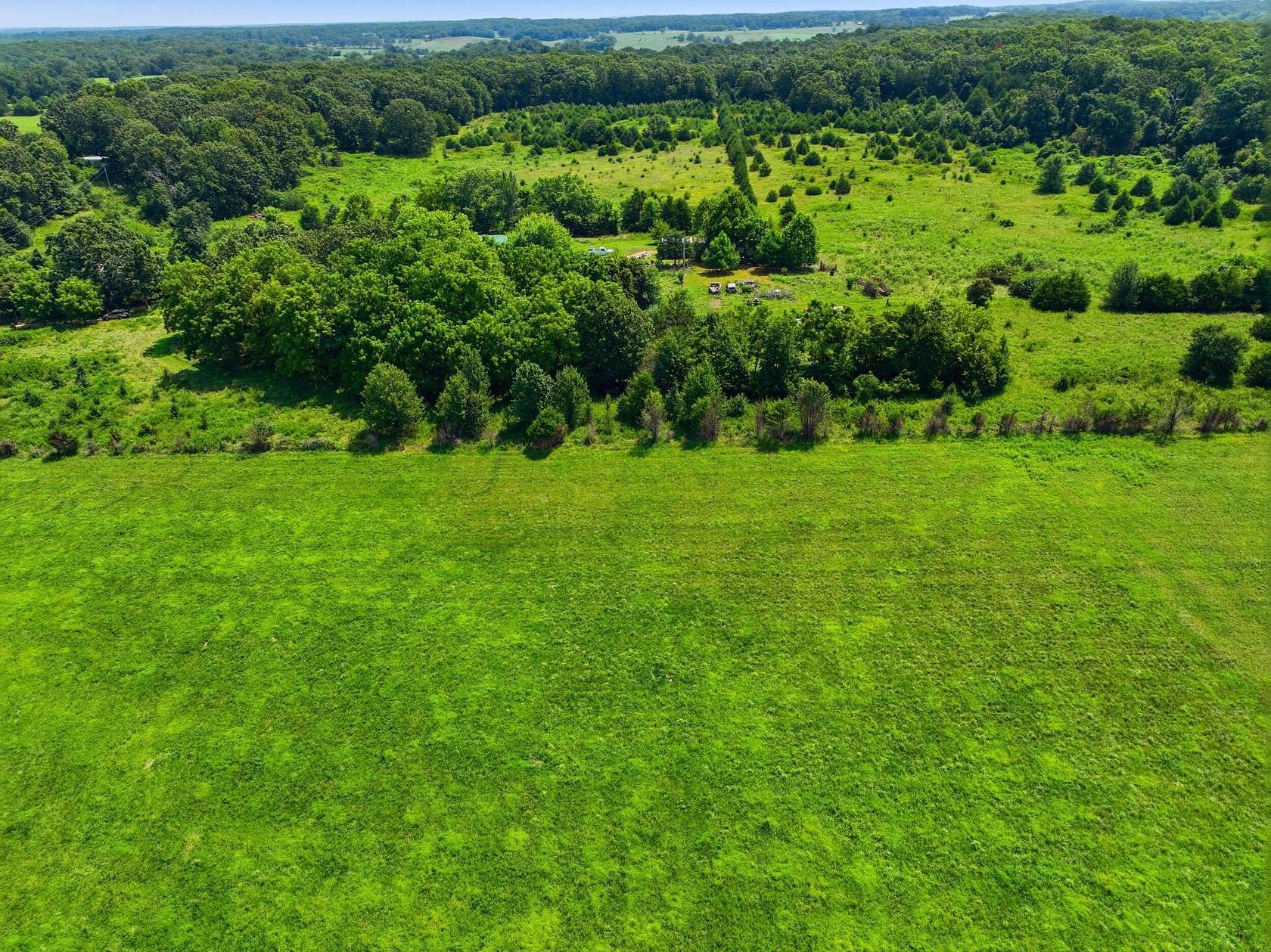 40.3 Acres of Recreational Land with Home for Sale in Pomona, Missouri