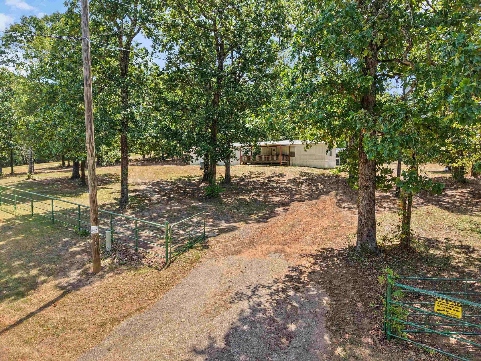 4.38 Acres of Land with Home for Sale in Lone Star, Texas
