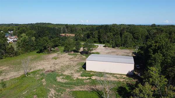 5.8 Acres of Improved Commercial Land for Sale in Mckean Township, Pennsylvania