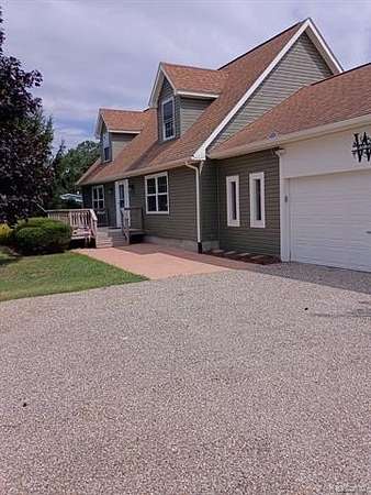 3 Acres of Land with Home for Sale in Holly Township, Michigan