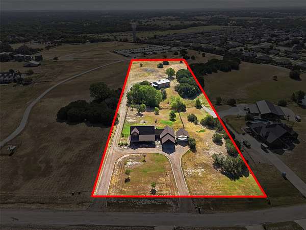 5.2 Acres of Land with Home for Sale in Granbury, Texas