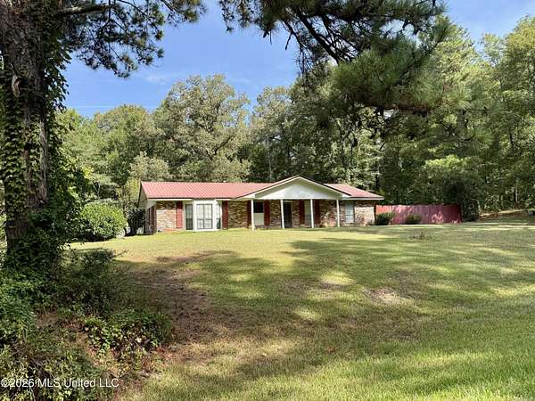 5.9 Acres of Land with Home for Sale in Roxie, Mississippi