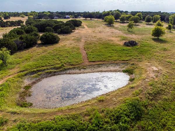 10 Acres of Land with Home for Sale in Kopperl, Texas