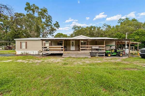 2.5 Acres of Land with Home for Sale in Spring Hill, Florida