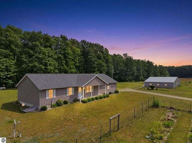 78.5 Acres of Recreational Land with Home for Sale in Cadillac, Michigan