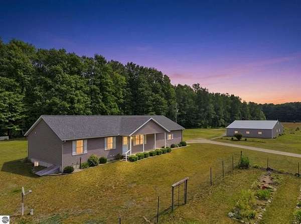 78.5 Acres of Recreational Land with Home for Sale in Cadillac, Michigan