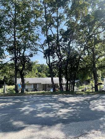 1.5 Acres of Land with Home for Sale in Pineville, Missouri