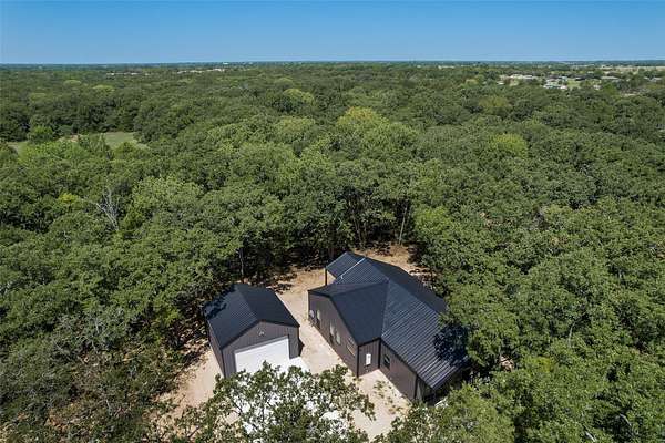1.74 Acres of Land with Home for Sale in Quinlan, Texas