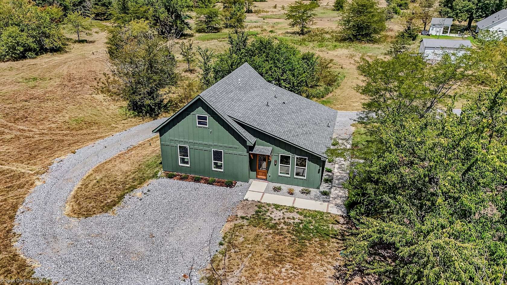 5 Acres of Land with Home for Sale in Wolfe City, Texas