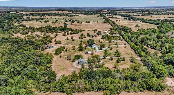 5 Acres of Land with Home for Sale in Wolfe City, Texas