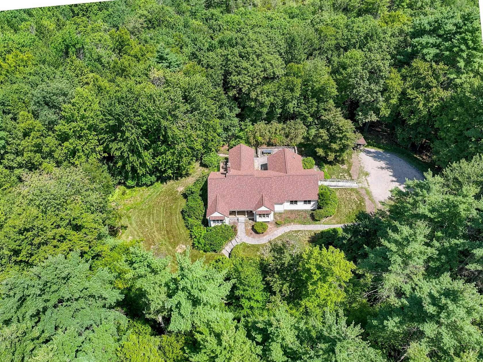 5 Acres of Land with Home for Sale in New Boston, New Hampshire