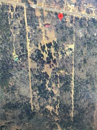 18.4 Acres of Land with Home for Sale in Quitman, Texas
