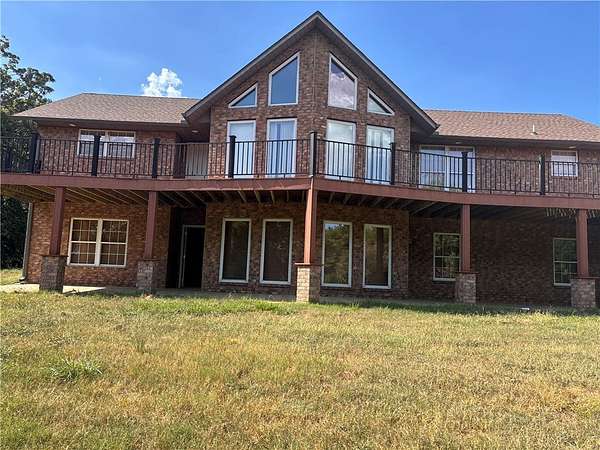14.8 Acres of Land with Home for Lease in Gravette, Arkansas