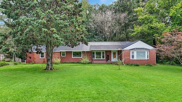 7.35 Acres of Land with Home for Sale in McConnelsville, Ohio