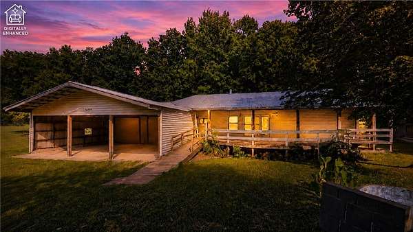 38.8 Acres of Land with Home for Sale in Gravette, Arkansas