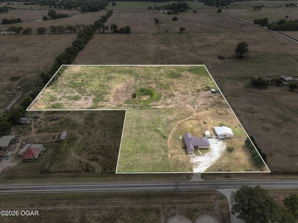 7.75 Acres of Land with Home for Sale in Sarcoxie, Missouri