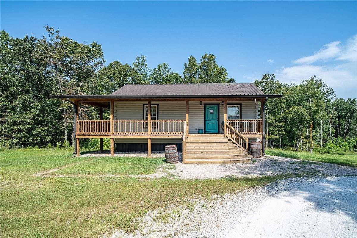 8.2 Acres of Land with Home for Sale in Hohenwald, Tennessee