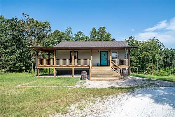 8.2 Acres of Land with Home for Sale in Hohenwald, Tennessee