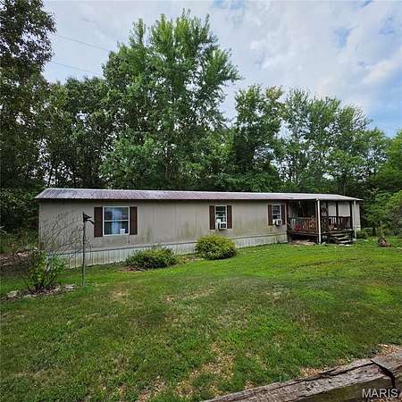 5 Acres of Land with Home for Sale in Gatewood, Missouri