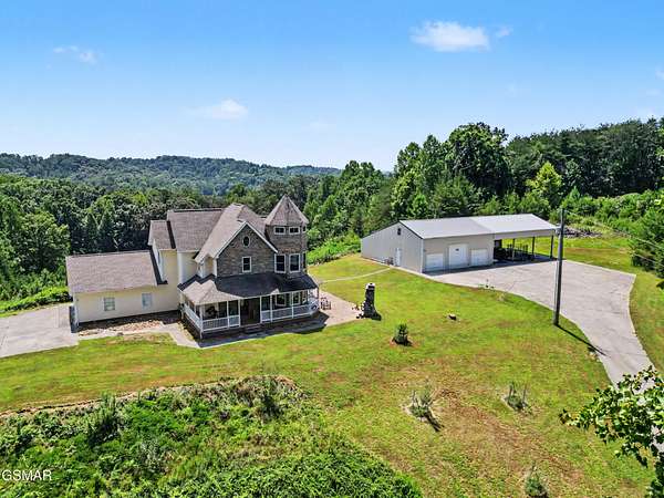 11.3 Acres of Land with Home for Sale in Madisonville, Tennessee