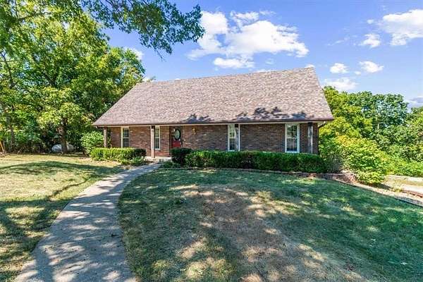 4 Acres of Land with Home for Sale in Oak Grove, Missouri