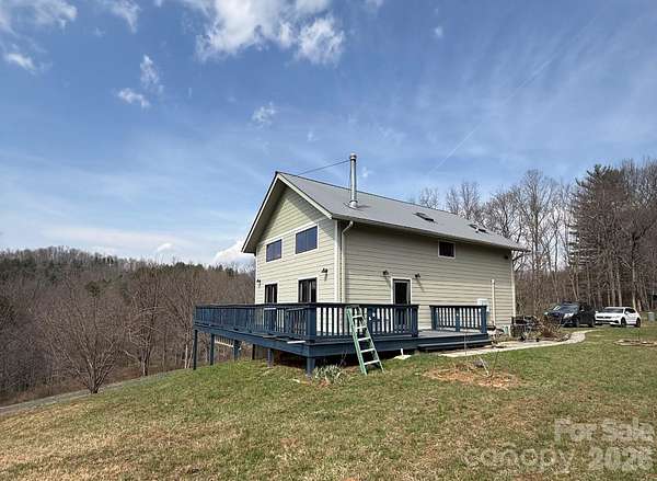 6.6 Acres of Land with Home for Sale in Bakersville, North Carolina
