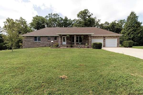 21.4 Acres of Land with Home for Sale in Seymour, Missouri