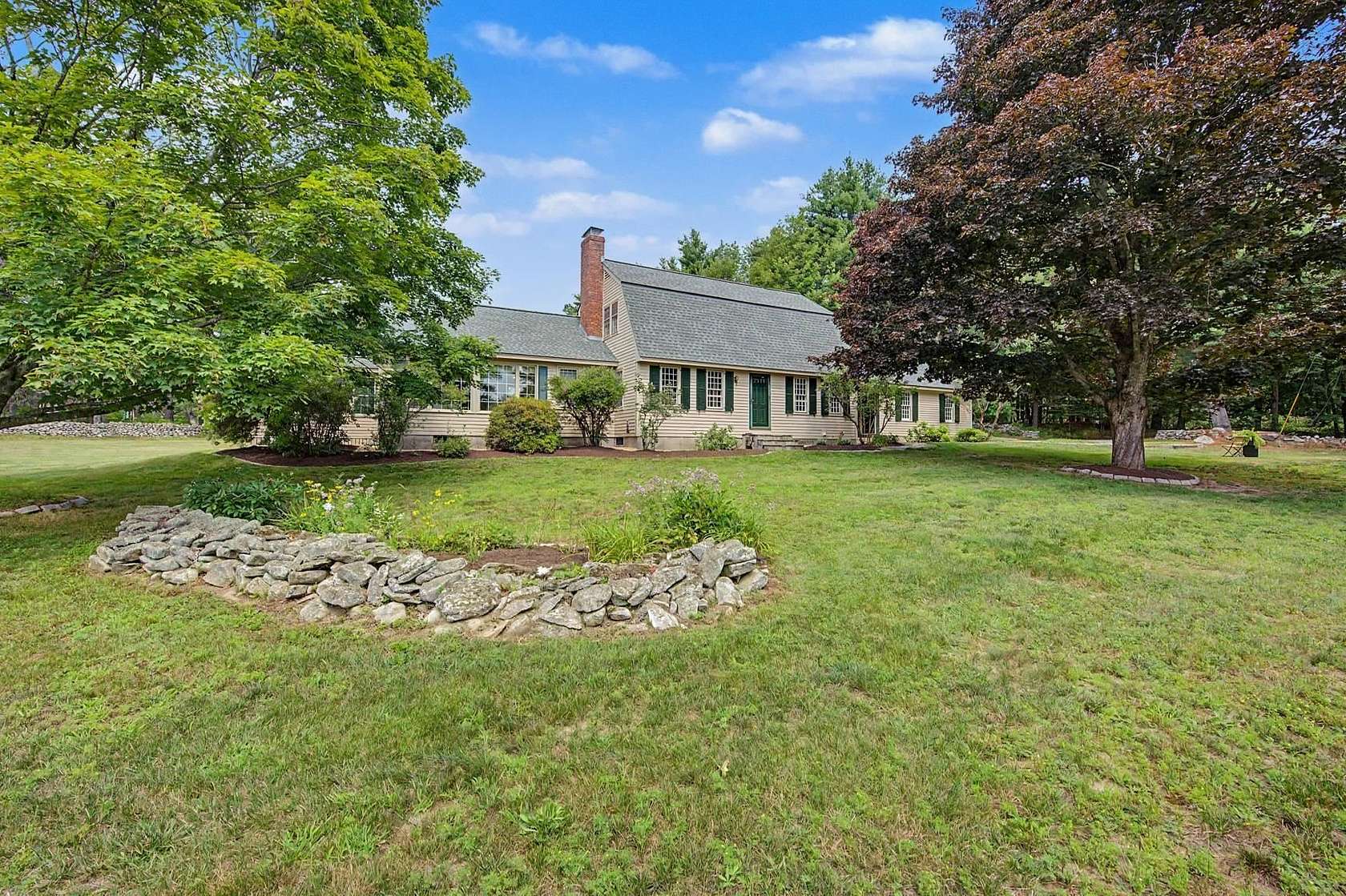 3.1 Acres of Land with Home for Sale in New London, New Hampshire