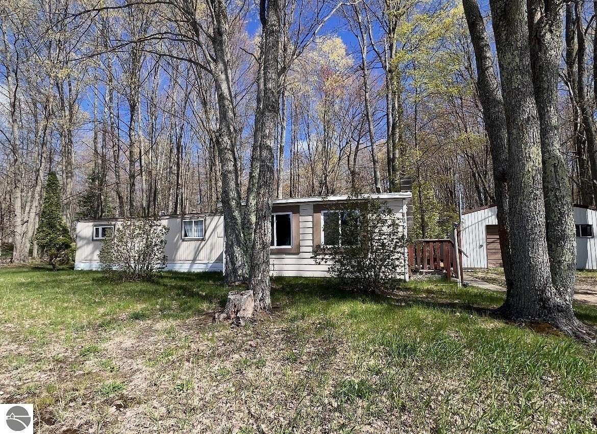 2.5 Acres of Land with Home for Sale in South Boardman, Michigan