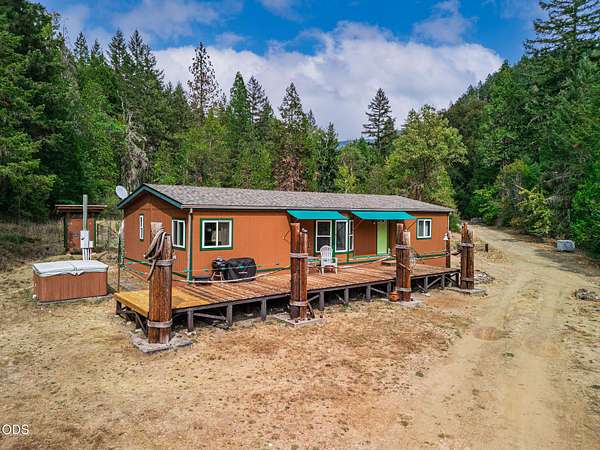 5.12 Acres of Land with Home for Sale in Wolf Creek, Oregon