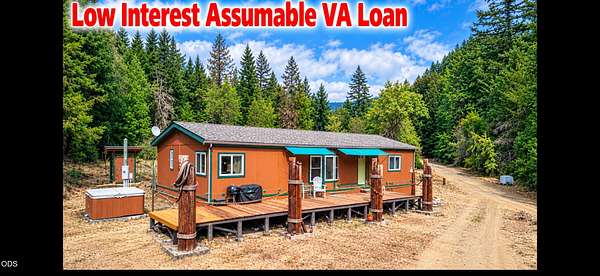 5.12 Acres of Land with Home for Sale in Wolf Creek, Oregon
