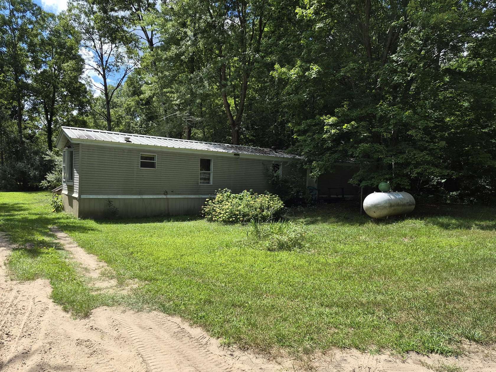3 Acres of Land with Home for Sale in Hesperia, Michigan