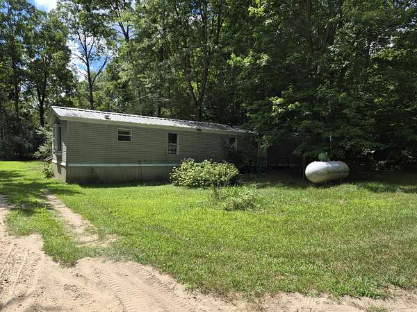 3 Acres of Land with Home for Sale in Hesperia, Michigan