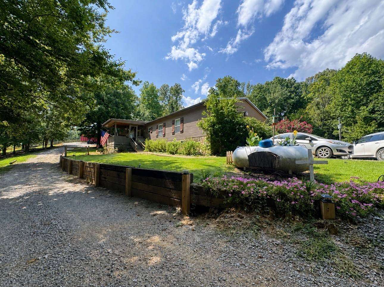 24.2 Acres of Recreational Land with Home for Sale in Holcomb, Mississippi