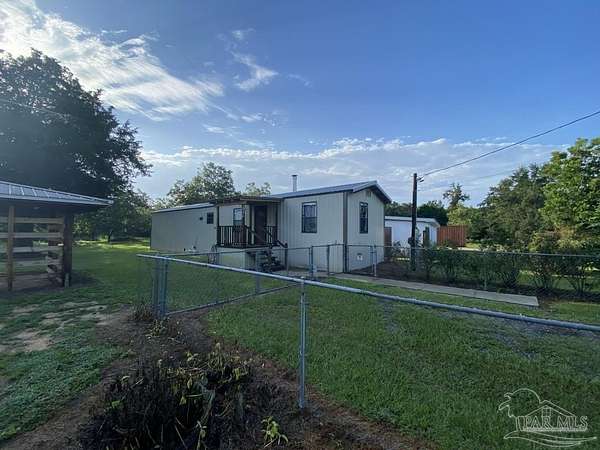 5 Acres of Land with Home for Sale in Molino, Florida