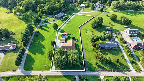 1.72 Acres of Land with Home for Auction in Cottontown, Tennessee
