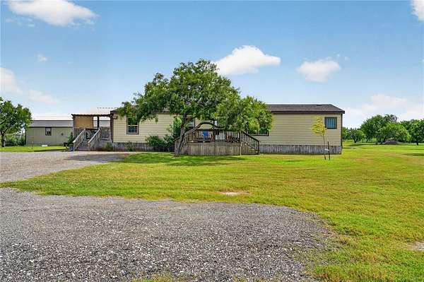 5 Acres of Land with Home for Sale in Aransas Pass, Texas