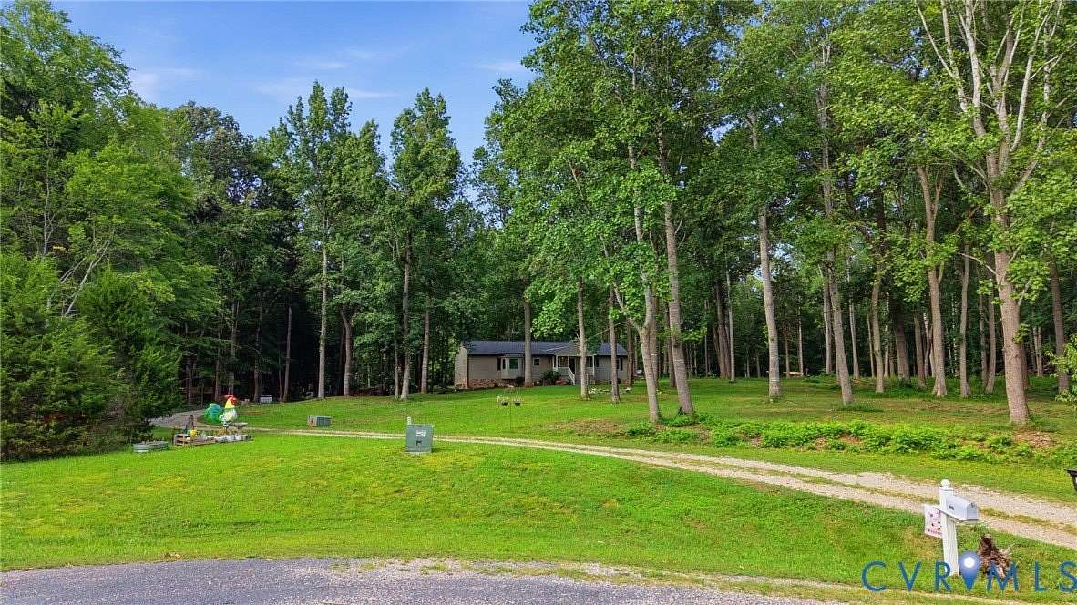 10.7 Acres of Land with Home for Sale in Powhatan, Virginia
