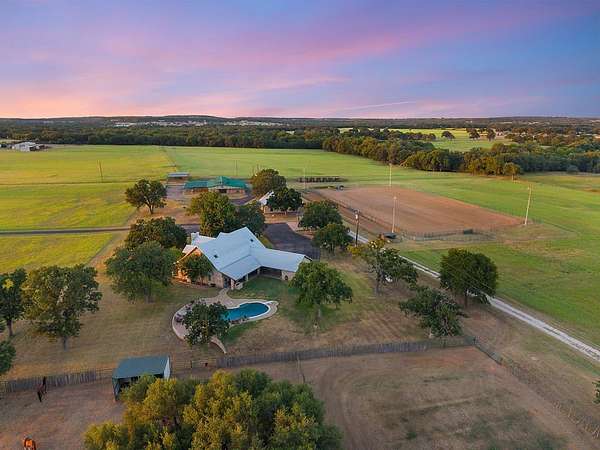 71.5 Acres of Agricultural Land with Home for Sale in Stephenville, Texas
